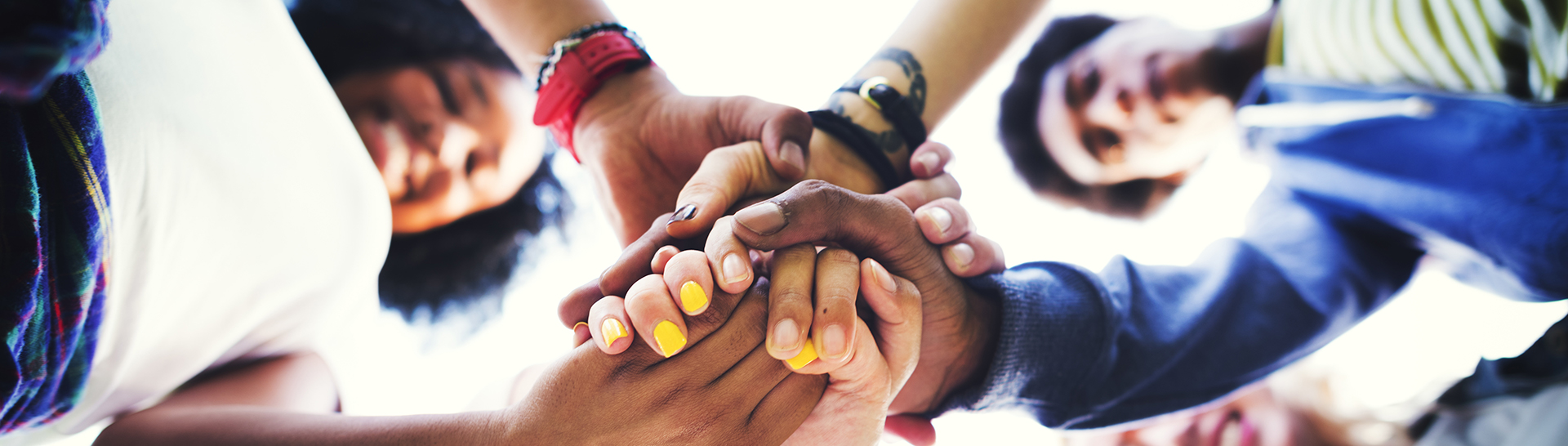 Happy-people-hands-cropped